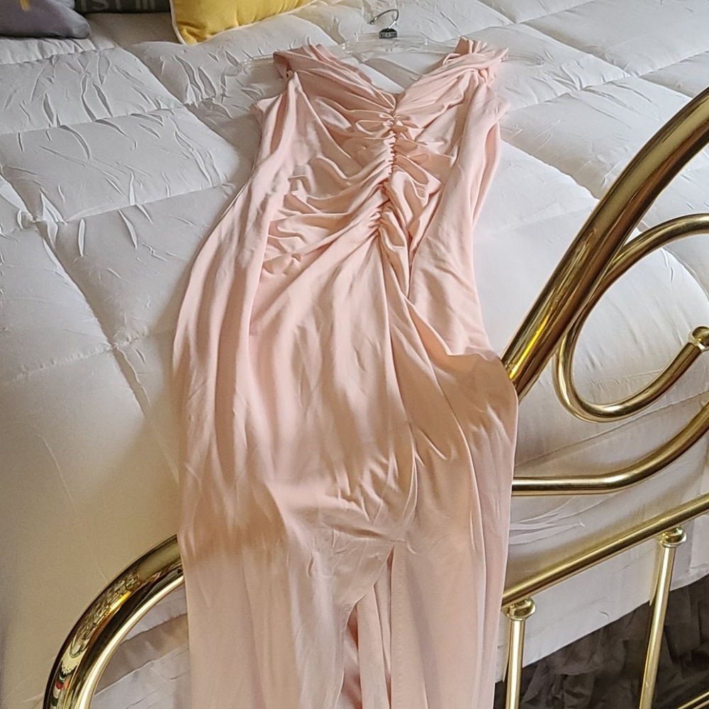 Long peach colored sleeveless dress